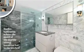  ?? ?? Marble bathroom echoes the motif of the marble island/ breakfast bar in the kitchen