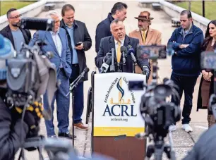  ?? PHOTOS BY RYAN GARZA/DETROIT FREE PRESS ?? Arab American Civil Rights League founder Nabih Ayad speaks during a news conference by the ACRL outside of the Dearborn Police Department on Monday, denouncing the article called “Welcome to Dearborn, America’s Jihad Capital,” published by The Wall Street Journal. Many leaders in the state are condemning the article.