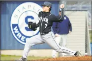  ?? Christian Abraham / Hearst Connecticu­t Media ?? Xavier senior left-hander Ray Seward pitches against Staples on April 7 in Westport.