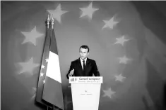  ??  ?? French President Emmanuel Macron addresses a press conference at the EU summit in Brussels, Belgium. — Reuters photo