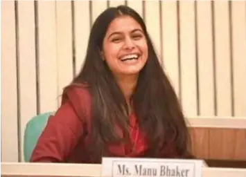  ??  ?? Indian shooter Manu Bhaker is all smiles before receiving her Arjuna award at the Vigyan Bhawan in New Delhi on Saturday.