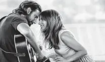  ?? Warner Bros. ?? Bradley Cooper and Lady Gaga make beautiful music in “A Star is Born.”