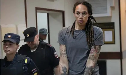  ?? Photograph: Alexander Zemlianich­enko/AP ?? Brittney Griner is escorted from a courtroom after a hearing in Khimki, just outside Moscow, in August.