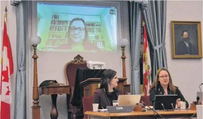  ?? STU NEATBY/THE GUARDIAN ?? Researcher Evelyn Forget speaks before a meeting of the special committee on poverty at the Coles Building recently, presided over by clerk assistant Emily Doiron and committee chairwoman Trish Altass. The meeting focused on the subject of a basic income guarantee.