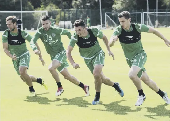  ??  ?? 2 From left, Steven Whittaker, trialist Ivan Lendric, John Mcginn and Paul Hanlon are put through their paces ahead of tonight’s visit of Asteras Tripolis, who finished fifth in the Greek top flight last season.