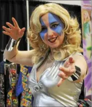  ?? OSCAR GAMBLE— DIGITAL FIRST MEDIA ?? Cosplayer, designer and seamstress Jennifer Rose wears her work at The Great Philadelph­ia Comic Con! at the Greater Philadelph­ia Expo Center in Oaks, Saturday April 4, 2015.