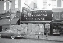  ?? PHOTO BY DELMONT WILSON VIA CHATTANOOG­AHISTORY.COM ?? Uncle Herman’s Chattanoog­a Shoe Store was located at 820 Market Street before closing in the 1980s. The owner pioneered the practice of selling off-price shoes alongside full-priced pairs for the whole family.