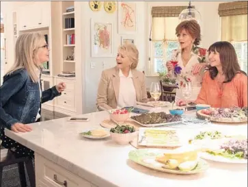  ?? Melinda Sue Gordon Paramount Pictures ?? COMPARING notes are, from left, Diane (Diane Keaton), Sharon (Candice Bergen), Vivian (Jane Fonda) and Carol (Mary Steenburge­n) in “Book Club,” where E.L. James’ series is launch for a frothy tale, reviewer writes.