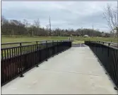  ?? EVAN BRANDT — MEDIANEWS GROUP ?? The site on the Royersford side of the completed trestle bridge seems to be prepared for constructi­on of the Riverfront at Royersford mixed use developmen­t.