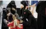  ?? - Reuters ?? HEALTH CRISIS: Women help a young relative infected with cholera at a hospital in Sanaa, Yemen on Monday.