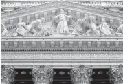  ?? Richard Drew / Associated Press file ?? The Dow Jones industrial average, which crossed the 23,000 mark for the first time this week, finished Friday with its fifth-straight all-time high.