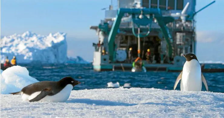  ?? BBC ?? Adelie penguins with the scientific research vessel M/V Alucia in background.