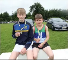  ??  ?? U16 Long Jump: David Phipps (second ) and Christy Mooney (first ).