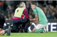  ?? GETTY IMAGES ?? Johnny Sexton of Ireland receives medical attention during the test against the All Blacks at Eden Park.