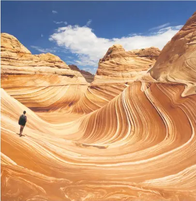  ??  ?? FAR FROM HOME: Wat Mahathat, in Ayutthaya Province, Thailand (above left) and the Paria Canyon-Vermilion Wilderness in Arizona, US (above) are locations on the bucket lists of Gen Z travellers. Cliffs