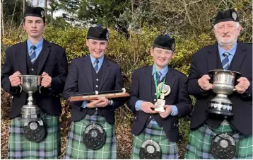  ?? ?? SEPTEMBER: Cullen Pipe Band Munster Champions featuring Eamonn Casey Novice Grade; Arthur Tarrant, Beginner Piper Grade; Ryan Milner, Beginner Drummer Grade and Con Houlihan, Piobaireac­hd Champion.