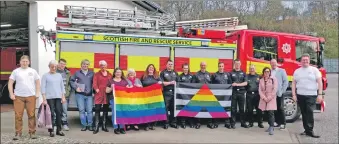  ??  ?? Representa­tives from community groups joined Oban firefighte­rs in support of Oban Pride 2019.