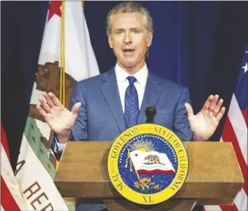  ?? PHOTO VIA AP ?? California Gov. Gavin Newsom speaks during a news conference on Friday, May 12, 2023, in Sacramento, California.