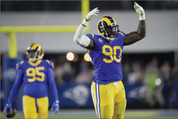  ?? MARK J. TERRILL — THE ASSOCIATED PRESS ?? Los Angeles Rams defensive end Michael Brockers celebrates during the second half in an NFL divisional football playoff game against the Dallas Cowboys Saturday in Los Angeles.