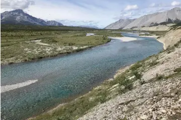  ??  ?? A stretch of the upper Wind River, at the northern reach of the Mackenzie Mountains.