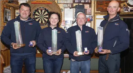  ??  ?? Michael Waters, Eithne Davies, Dermot Gillen and John Ryan who were recognised by the RNLI this year for 20 years volunteer service.