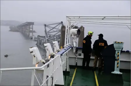  ?? PETER KNUDSON — NTSB VIA AP ?? National Transporta­tion and Safety Board investigat­ors work on the cargo vessel Dali, which struck and collapsed the Francis Scott Key Bridge on Wednesday in Baltimore. Federal and state officials have said the crash appeared to be an accident.