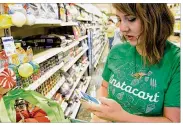  ?? GETTY IMAGES ?? Instacart alone has more than 50,000 dedicated shoppers in North America.