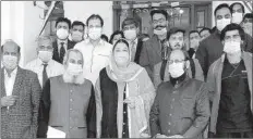  ?? -APP ?? Provincial Minister for Health Dr Yasmin Rashid in a group photo during a ceremony on death anniversar­y of renowned poet Faiz Ahmed Faiz at KIMU.