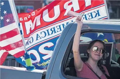  ?? PAUL RATJE AFP VIA GETTY IMAGES ?? Trump supporters participat­e in a car parade in El Paso, Texas, on Saturday.