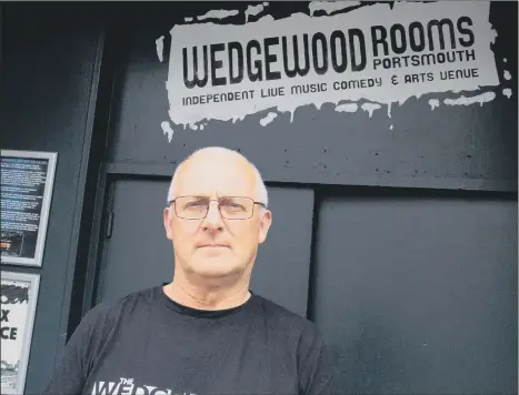 ??  ?? OVERCOME Geoff Priestley, manager of the Wedgewood Rooms in Albert Road, Southsea