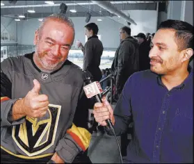  ?? Erik Verduzco Las Vegas Review-Journal @Erik_Verduzco ?? Spanish language radio broadcaste­r Jesus Lopez of ESPN Deportes 1460, left, and Las Vegas Review-Journal reporter Gilberto Manzano at City National Arena on Friday.