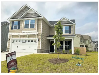  ?? AP/SWAYNE B. HALL ?? This new house was for sale last month in Raeford, N.C. New home sales jumped 18.9 percent in September to a seasonally adjusted annual rate of 667,000, the most in a decade, the Commerce Department said Wednesday.