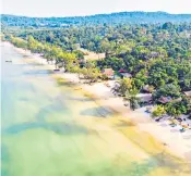  ?? ?? Swing into action (or laze under the sun) at Kep Beach in Kampot ‘Persistent­ly optimistic’: Cambodia’s people keep bouncing back