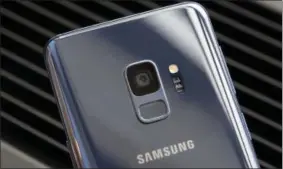  ??  ?? The camera lens of a Samsung Galaxy S9 mobile phone is shown.