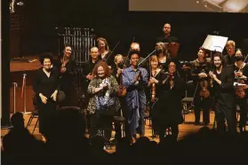  ?? Kristen Loken ?? Julia Bullock (left) with composers Carolyn Yarnell, Allison Loggins-Hull and Pamela Z; conductor Christian Reif; and S.F. Symphony members.