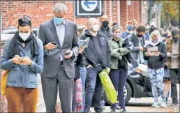  ??  ?? POLL IMPOSITION: Famously less-than-prompt Mayor de Blasio queues for nearly four hours on Monday to cast an early ballot in Park Slope.