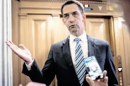  ?? NATHAN HOWARD TNS ?? Sen. Tom Cotton, R-Ark., speaks with members of the media March 22 in Washington, D.C.