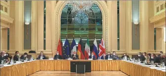  ?? EU DELEGATION IN VIENNA VIA XINHUA ?? Diplomats from world powers and Iran wait for the start of a meeting of the JCPOA Joint Commission in Vienna, Austria, on Tuesday.