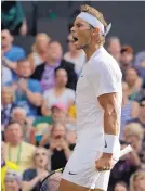  ?? KIRSTY WIGGLESWOR­TH/ASSOCIATED PRESS ?? Rafael Nadal reacts after winning a point against Nick Kyrgios in a men’s second round match of Wimbledon in London on Thursday. Nadal won the match.