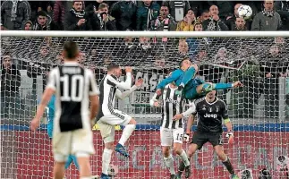  ?? PHOTOS: GETTY IMAGES/AP ?? Cristiano Ronaldo launches into his overhead kick that produced a memorable goal for Real Madrid.