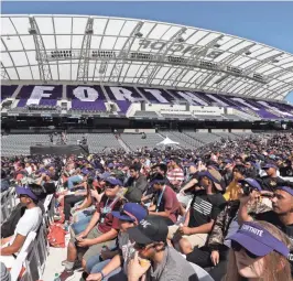  ?? CHRISTIAN PETERSEN/GETTY IMAGES ?? Gamers attend Epic Games’ “Fortnite” E3 Tournament on June 12 at Banc of California Stadium in Los Angeles.