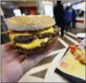  ?? MIKE STEWART — THE ASSOCIATED PRESS ?? A McDonald’s Double Quarter Pounder is shown with the new fresh beef Tuesday in Atlanta.