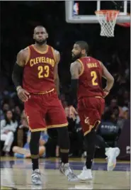  ?? JAE C. HONG — ASSOCIATED PRESS ?? Kyrie Irving might get a cold reception when he visits with the Celtics on Oct. 17. But the booing won’t be as passionate as it was for LeBron James when he played at Quicken Loans Arena with the Heat in 2010.