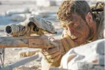 ?? DAVID JAMES/AMAZON STUDIOS AND ROADSIDE ATTRACTION­S VIA THE ASSOCIATED PRESS ?? Aaron Taylor-Johnson in a scene from “The Wall.”