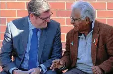  ?? PHOTO: CONTRIBUTE­D ?? SWAPPING TALES: Member for Groom Dr John McVeigh chats with Aboriginal elder Uncle Darby McCarthy at the opening of the NDIS Local Area Coordinati­on Partners in the Community Office in Toowoomba this week.