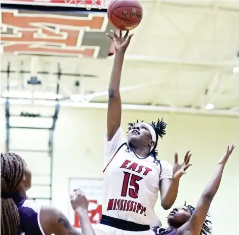  ??  ?? East Mississipp­i Community College women's basketball player Ja'mia Hollings goes up for a shot. (Submitted photo)