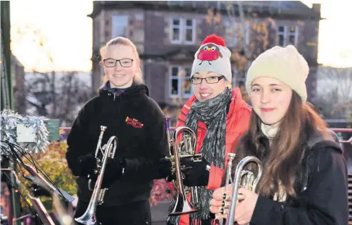  ??  ?? Music-makers
Trumpeters Naomi Parish, Leah Menzies and Lucy Douglas of Brass Central Strathearn, pictured last year before the pandemic