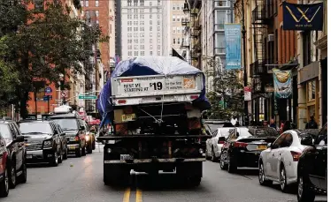  ?? SPENCER PLATT / GETTY IMAGES ?? Eight peoplewere killed and 12 were injured Tuesday afternoonw­hen suspect 29-year-old Sayfullo Saipov intentiona­lly drove a truck rented fromHomeDe­pot onto a bike path in lowerManha­ttan. The truckwas removed fromthe sceneWedne­sday.