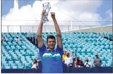  ?? (AP/Lynne Sladky) ?? Hubert Hurkacz celebrates after defeating Yannik Sinner in the Miami Open men’s final Sunday in Miami Gardens, Fla. Hurkacz won 7-6 (4), 6-4.