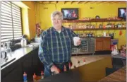  ?? RAY SKOWRONEK — THE MACOMB DAILY ?? Frank Nazar, owner of Gino’s Surf, stands behind the bar of Luna Kai, a 5,500-square-foot addition to the 17,000-square-foot banquet facility that was subject of a legal dispute.